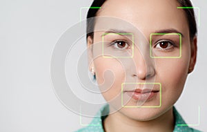 Futuristic and technological scanning of the face of a beautiful woman for facial recognition and scanned person. It can serve to