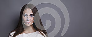 Futuristic and technological scanning of face for facial recognition photo