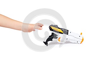 Futuristic toy gun with kid hand, isolated on white background