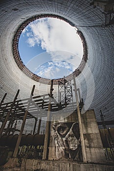 Futuristic view inside of cooling tower of unfinished Chernobyl nuclear power plant. Catastrophe, industry.