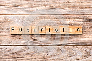 Futuristic word written on wood block. Futuristic rors text on wooden table for your desing, concept