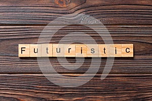 Futuristic word written on wood block. Futuristic text on wooden table for your desing, concept