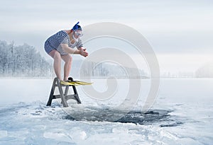 Fuunny retro swimmer about to jump into ice hole