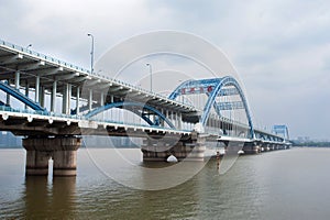 Fuxing Bridge on the Qiantang River, Hanghzou, China. The sign on the bridge reads `Fuxing Big Bridge` in traditional Chinese