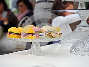 people self serve catering buffet finger food indoor in luxury location in Italy photo