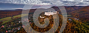 Fuzer, Hungary - Aerial panoramic view of the beautiful Castle of Fuzer with sunrise sky and clouds on an autumn morning