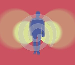 Fuzzy blue silhouette of a man in motion in the center against a background of two bright yellow circles of lights on a red backgr