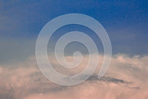 Fuzzy cloud on the blue sky.