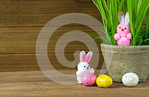 Fuzzy Easter bunnies with plant