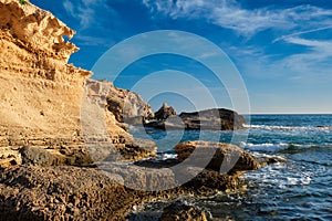 Fyriplaka beach on sunset, Milos island, Cyclades, Greece photo