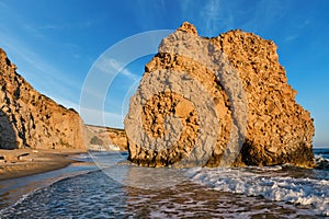 Fyriplaka beach on sunset, Milos island, Cyclades, Greece photo