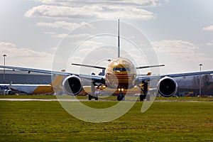 G-DHLY a 777 taxing out for take off at EMA - stock photo.jpg