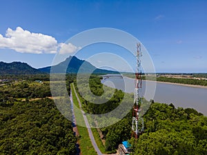 4g and 5g cellular telecommunication towers with landscape scenery of forest