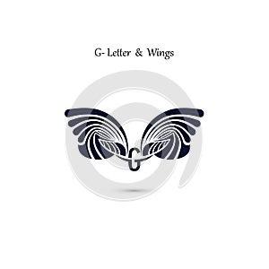 G-letter sign and angel wings.Monogram wing vector logo template