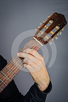 G major open chord played by Guitarist on classical acoustic gu