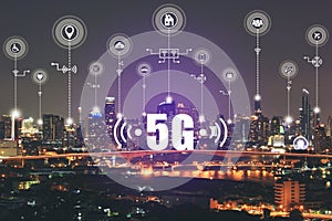 5G Network wireless systems and Internet of Things IoT, Smart city with smart services and icon or hologram, Communication