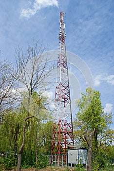 4G TV radio tower with parabolic antenna and satellite dish. Broadcast network signal. High coverage area.