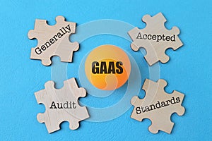 GAAS concept. Jigsaw puzzle with text Generally, Accepted, Audit and Standards