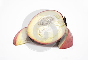 gab or Velvet apple fruit slices isolate on white background photo