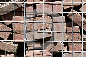 Gabion with concrete blocks