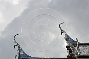 Gable apex on silver roof church