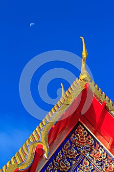 Gable apex of thai temple and moon