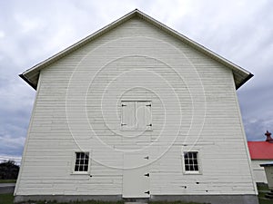 Gable barn side of Shaker white livestock barn at Watervliet