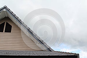 Gable roof on blue sky background