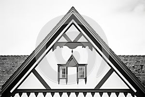 gable roof detail on a black and white tudor home