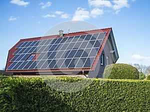 Gable roof with photovoltaics side view photo