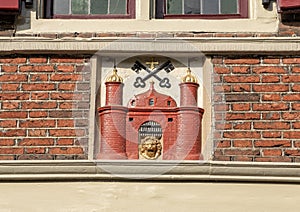 Gable Stone, The Riga Coat of Arms house in Amsterdam, located at Oudezijds Voorburgwal 14.