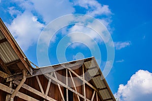 Gable of wooden houses and galvanized walls