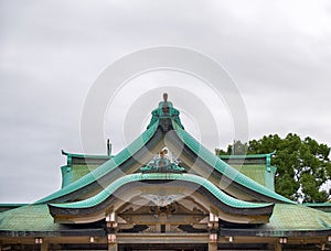The gabled roof of Hokoku Shrine Haiden in the Osaka Castle. Osaka. Japan