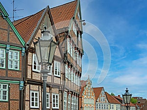 Gables of old houses and historical street lamps in the old town of the Hanseatic city of Stade, Lower Saxony, Germany