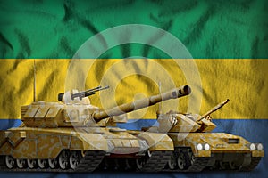 Gabon tank forces concept on the national flag background. 3d Illustration
