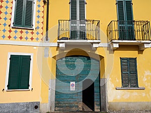 Gaggiano, Milan Italy: exterior of historic houses along the Naviglio Grande photo