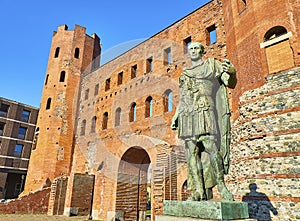 Gaius Julius Caesar Statue at Porta Palatina Gate. Piazza Cesare Augusto square. Turin, Piedmont, Italy photo