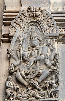 Gajasurasamhara, Shiva slaying the demon, at Chennakeshava Temple in Belur, India