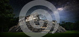 Galactic night starry sky over the ancient Mayan city of Palenque in Mexico