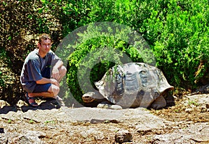 Galapagos Tortoise and tourist