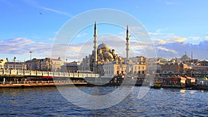 Galata bridge and Yeni Mosque photo