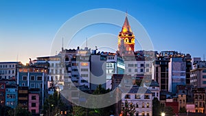 Galata Tower at night, Istanbul, Turkey. Medieval Galata Tower is a famous landmark of Istanbul city. Panorama of Beyoglu district