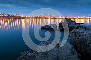 Galati city lights mirroring in the evening in the Danube