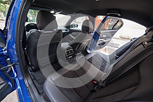 Galati, Romania - July 4, 2020: 2020 Blue BMW 3 Series G20 M340i xDrive Steptronic interior backseat photo