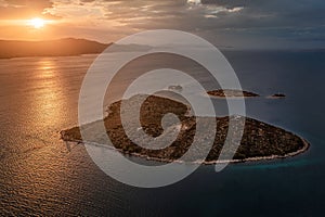 Galesnjak, Croatia - Aerial panoramic view of the beautiful heart-shaped island Galesnjak with a colorful warm summer sunset