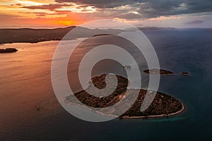 Galesnjak, Croatia - Aerial panoramic view of the beautiful heart-shaped island Galesnjak with a colorful warm summer sunset