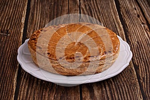 Galette des rois on a wooden table