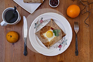 Galette sarrasin, buckwheat crepe, with ham cheese and egg, french brittany cuisine