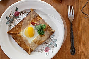 Galette sarrasin, buckwheat crepe, with ham cheese and egg, french brittany cuisine