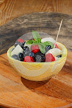 Galia melon, cantaloupe, raspberries, blackberries, blueberries